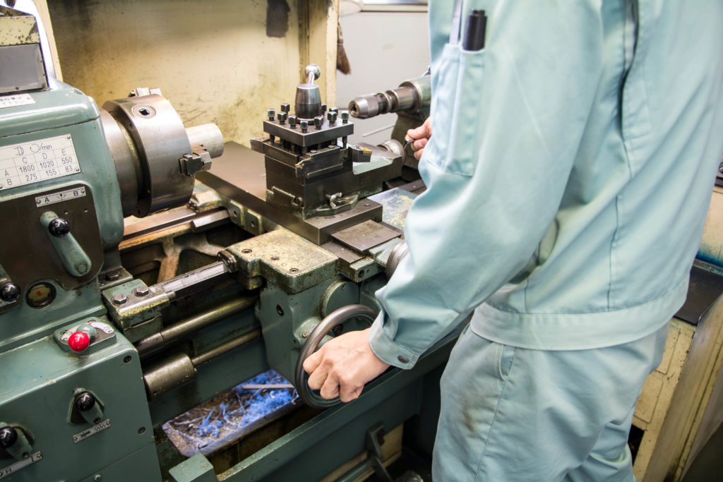 a mechanic working on a machine